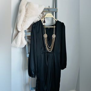 Gently used black satin dress.